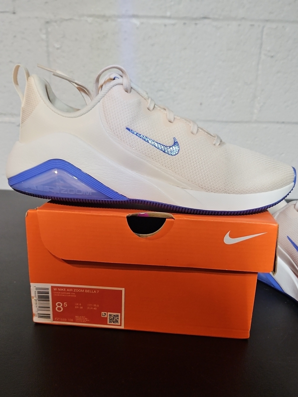 Nike Women's Sneakers - Cream with Blue Accents